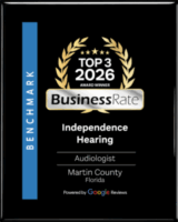 A plaque with Top 3 2026 Award Winner Business Rate laurel graphic, awarded to Independence Hearing, Audiologist, Martin County, Florida, powered by Google Reviews, with Benchmark on a blue vertical stripe.